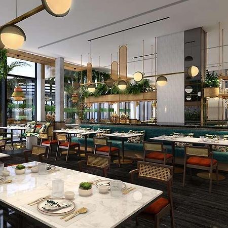 Momentus Hotel Alexandra Сингапур Ресторан фото